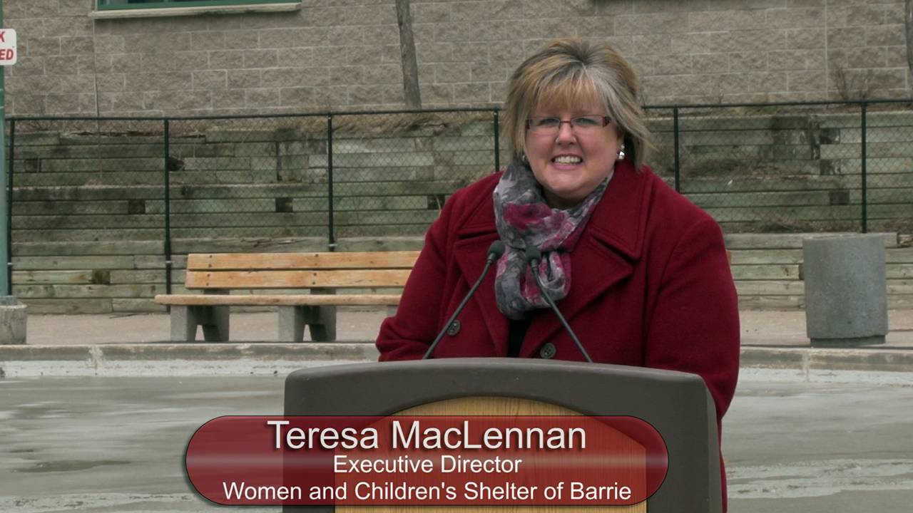 Teresa MacLennan, Ex. Dir of the Women and Children's Shelter fired up the crowd