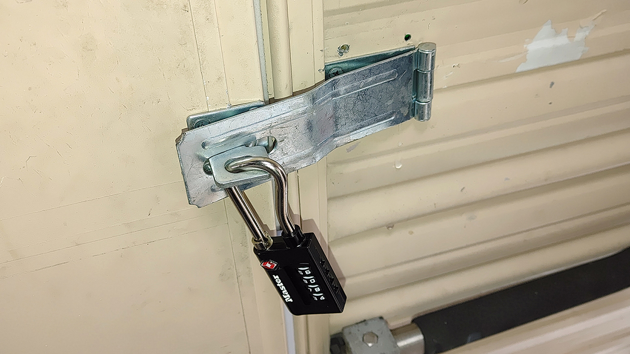 The rent being fully paid through to the end of April. Regardless, the landlord installed this lock and hasp.
